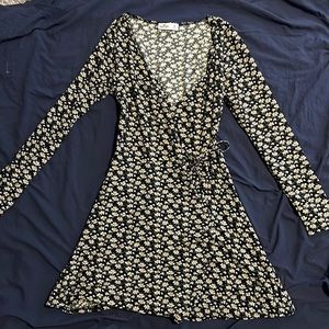 Black Hollister dress with a floral daisy print